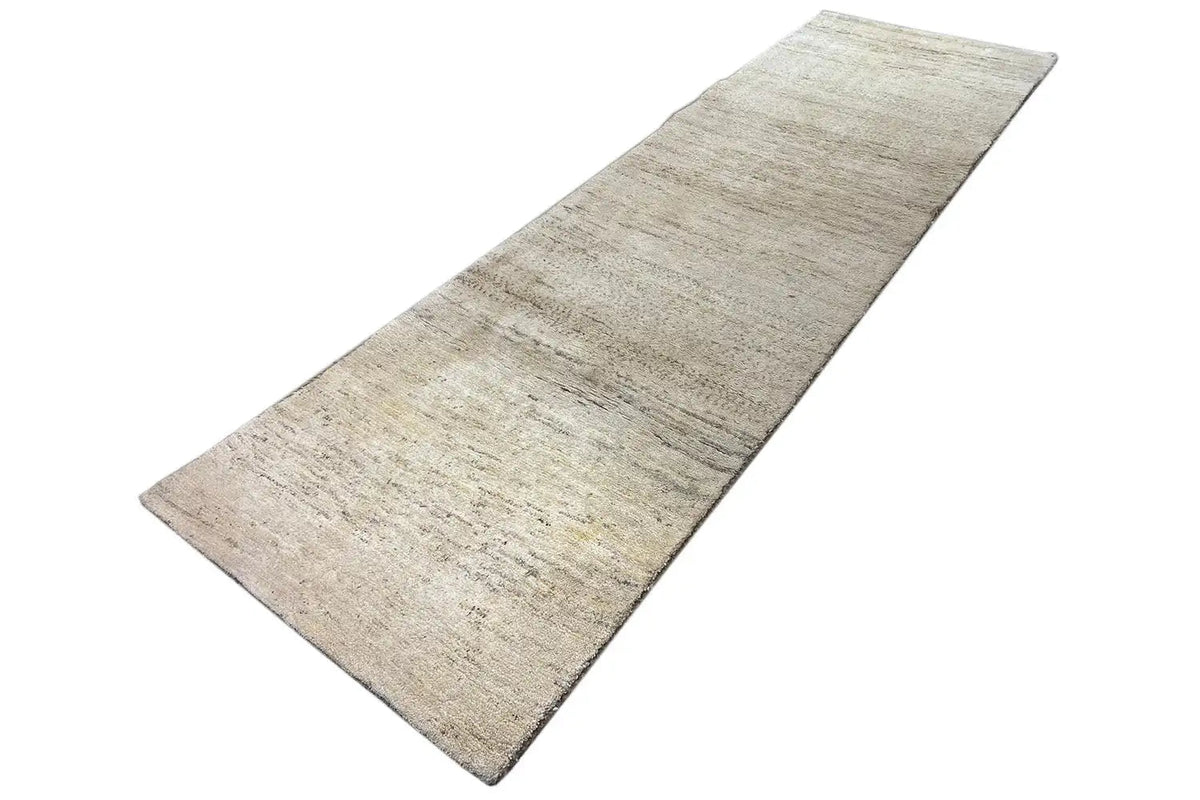 Gabbeh rug 282x82 cm, cream-colored runner with a mottled texture and visible edges