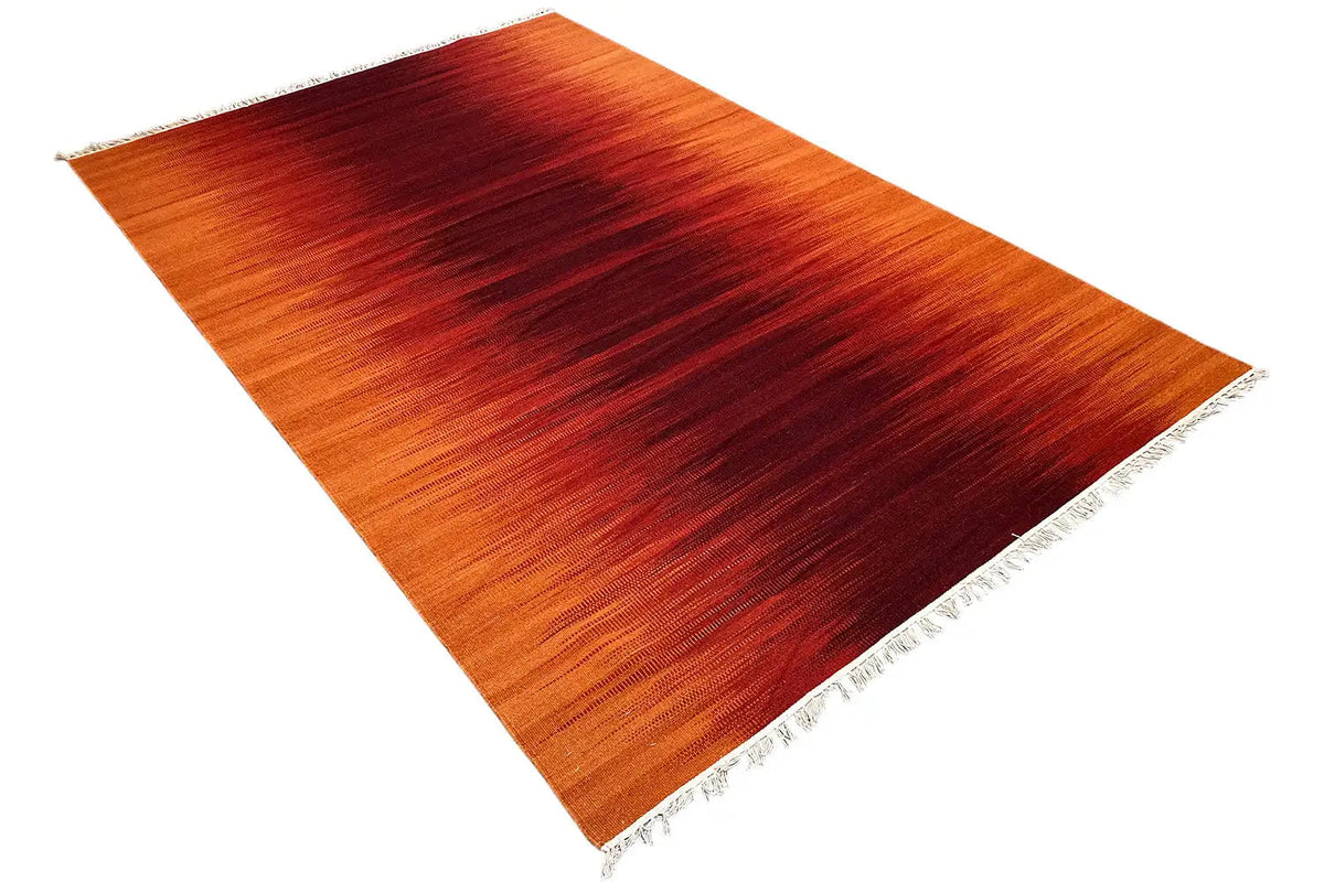 Modern kilim-dhurrie rug, laid at an angle, orange-brown with dark red stripes