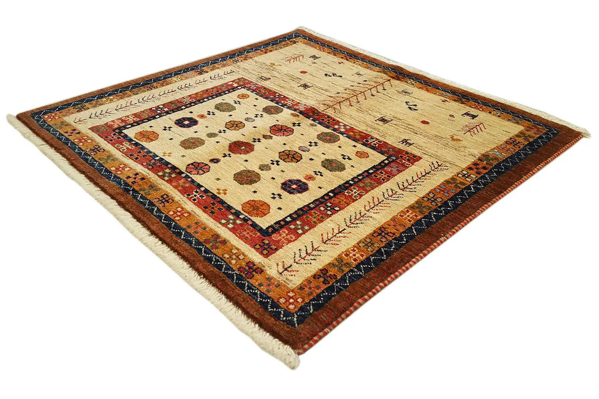 Oriental rug with a square border pattern in cream, red and dark blue