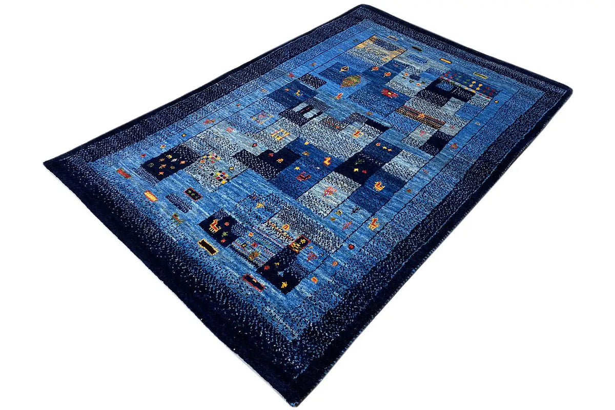 Gabbeh rug, square-shaped format, blue pattern with a dark border