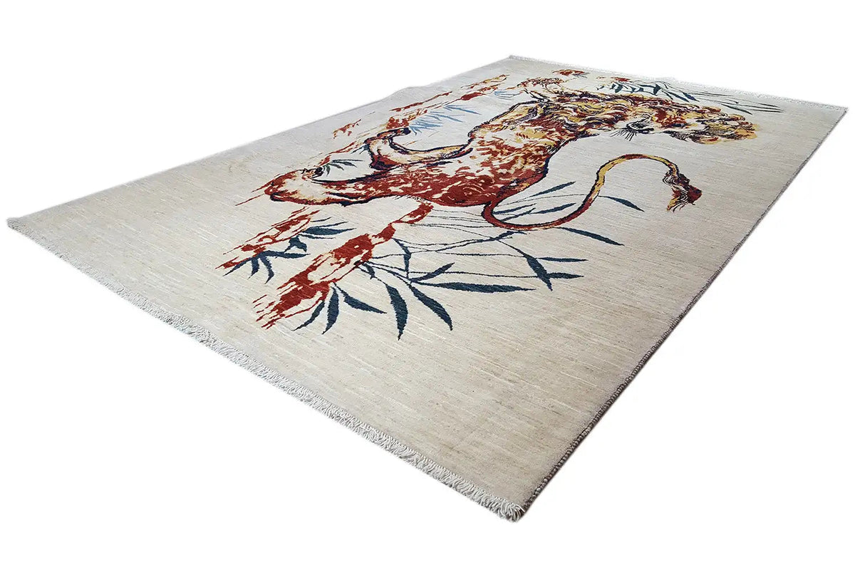 Oriental rug with a lion motif in red, brown, and blue, rectangular with fringes