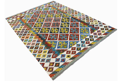 Afghan kilim at an angle, multicolored diamonds and squares