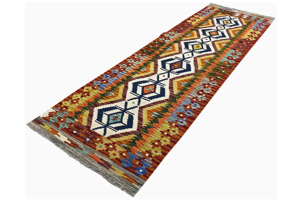 Afghan kilim runner with border and diamond motifs, side fringes