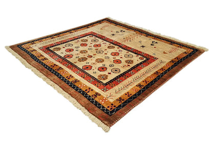 Rug with a patterned central field, multicolored border, and fringes