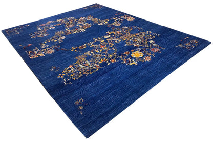 Blue Gabbeh rug, diagonal view with colorful ornamental fields in the pattern