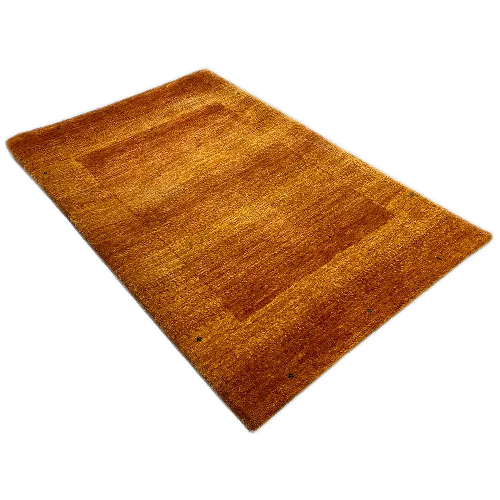 Lori Gabbeh rug with abstract orange-brown color fields, flat-weave