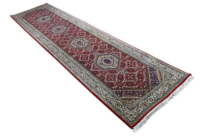 Bidjar runner with borders and medallions in red, blue and beige, laid diagonally