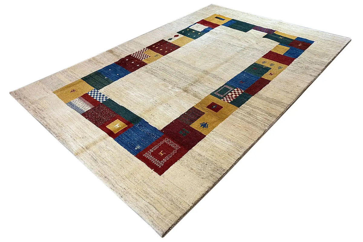 Gabbeh rug 305x200 cm, lying at an angle: cream-colored base with colorful decorative panels