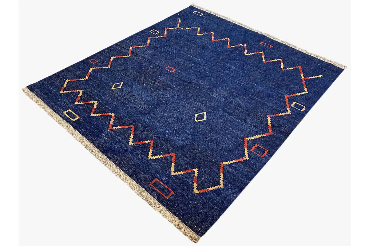 Qashqai kilim rug, blue diamond-shaped central pattern with colored lines, fringes