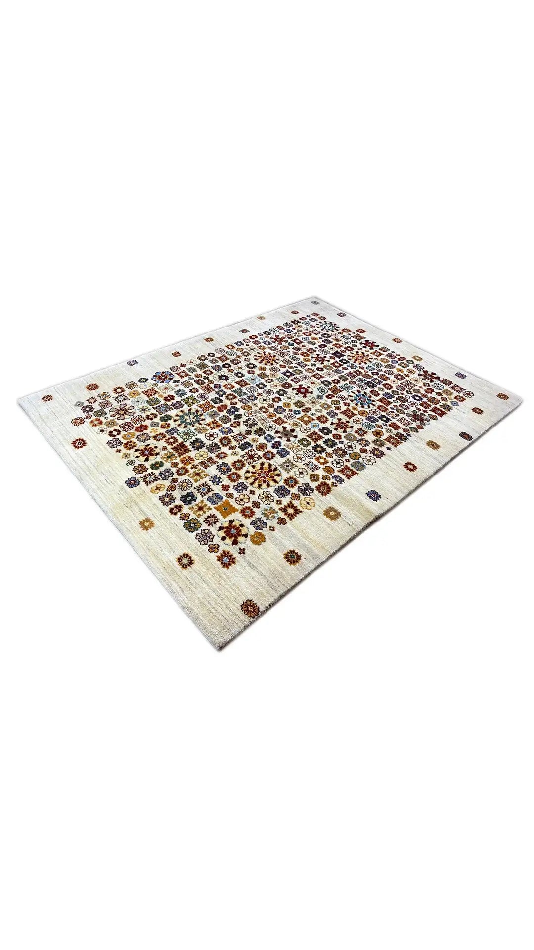 Corner view: rug with a colorful small-scale pattern on a light cream-colored background