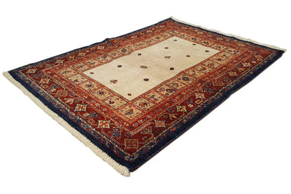 Rectangular rug with a central field and decorative border, red, blue and beige