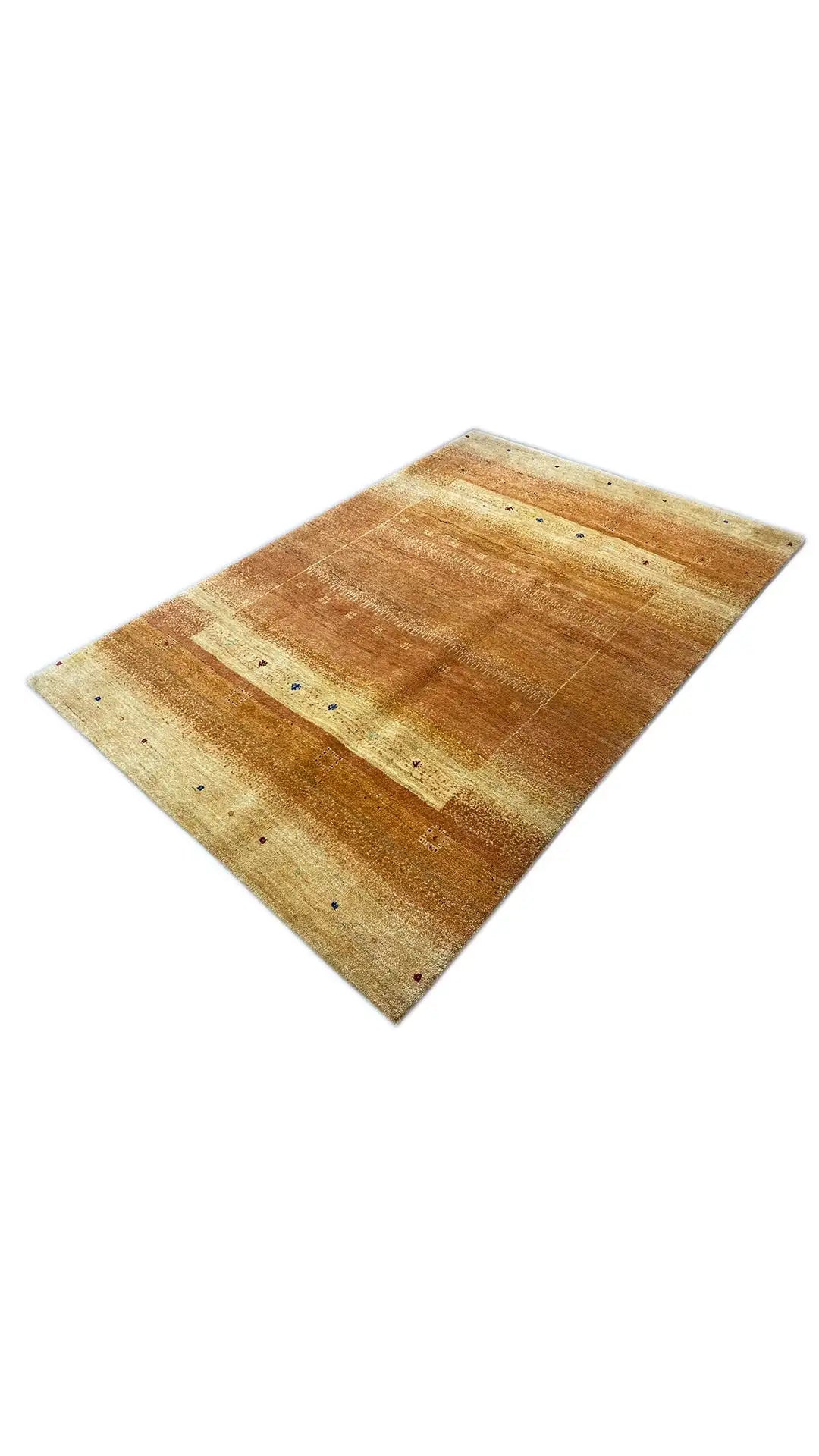 Gabbeh rug, laid out diagonally, warm brown-beige pattern with small dots
