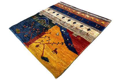 Gabbeh Lori rug at an oblique angle, multicolored central and border band