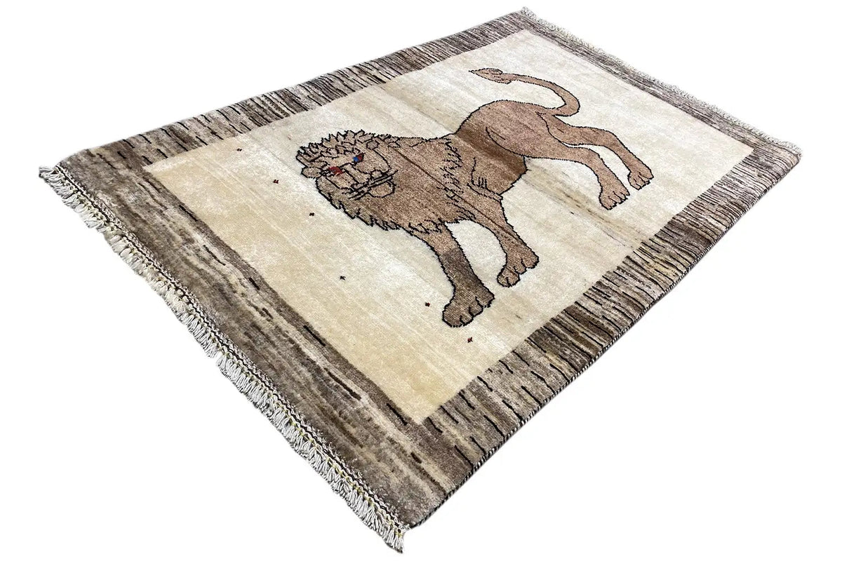Gabbeh rug with lion motif, beige field, brown border, fringe