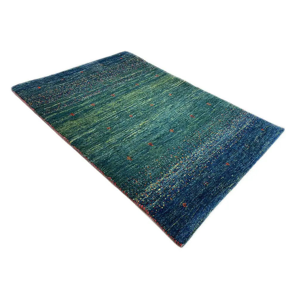 Gabbeh rug 91x63 cm, diagonal, green-blue and dark blue with colorful dots