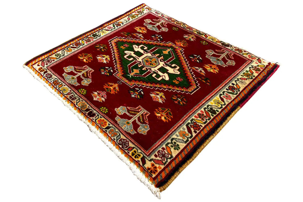 Qashqai rug Poshti 62x57 cm, diagonal view: red ornamental field with border
