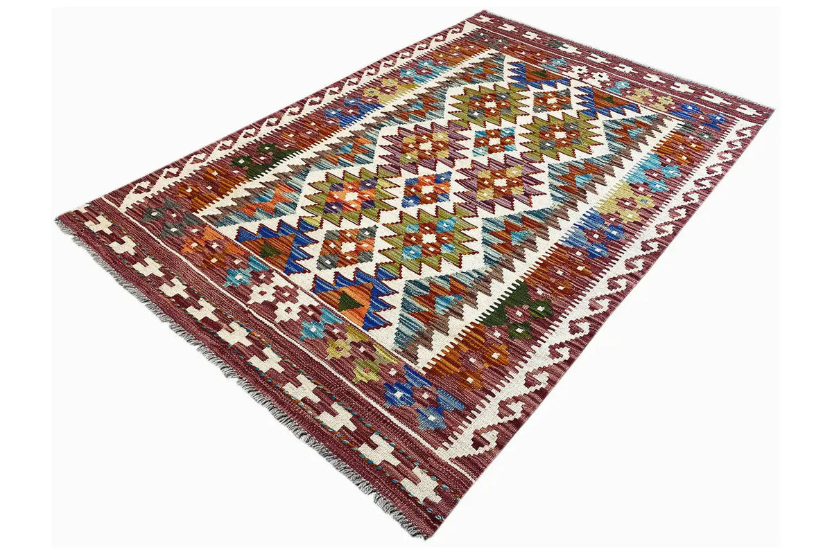 Afghan kilim (148x95 cm) laid diagonally, colorful tribal patterns and border ornaments