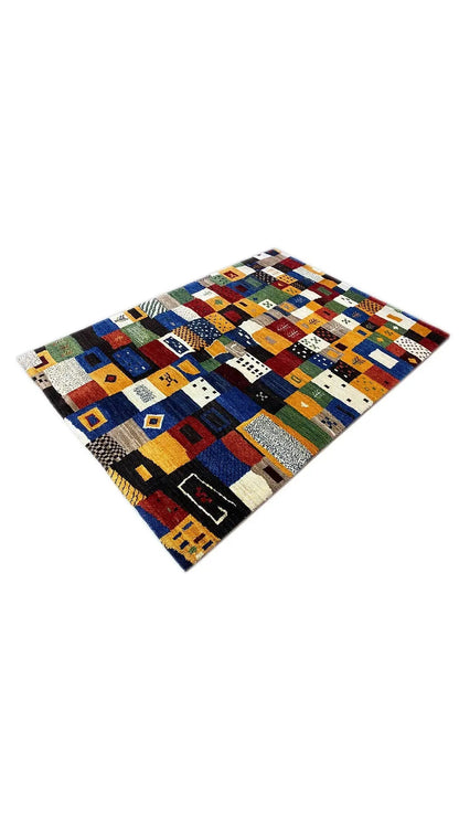 Gabbeh rug 194x140 cm, laid out diagonally with colorful square and diamond motifs