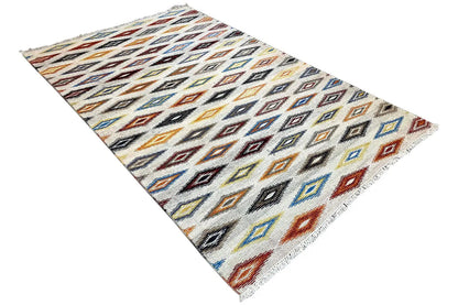 Kelim dhurrie rug in a diagonal view, geometric diamond and zigzag pattern