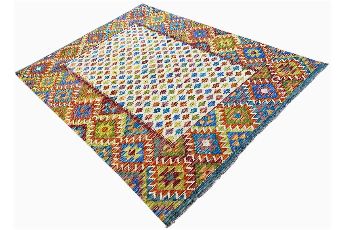 Afghan kilim rug, diagonal view with diamonds and zigzags in a border style