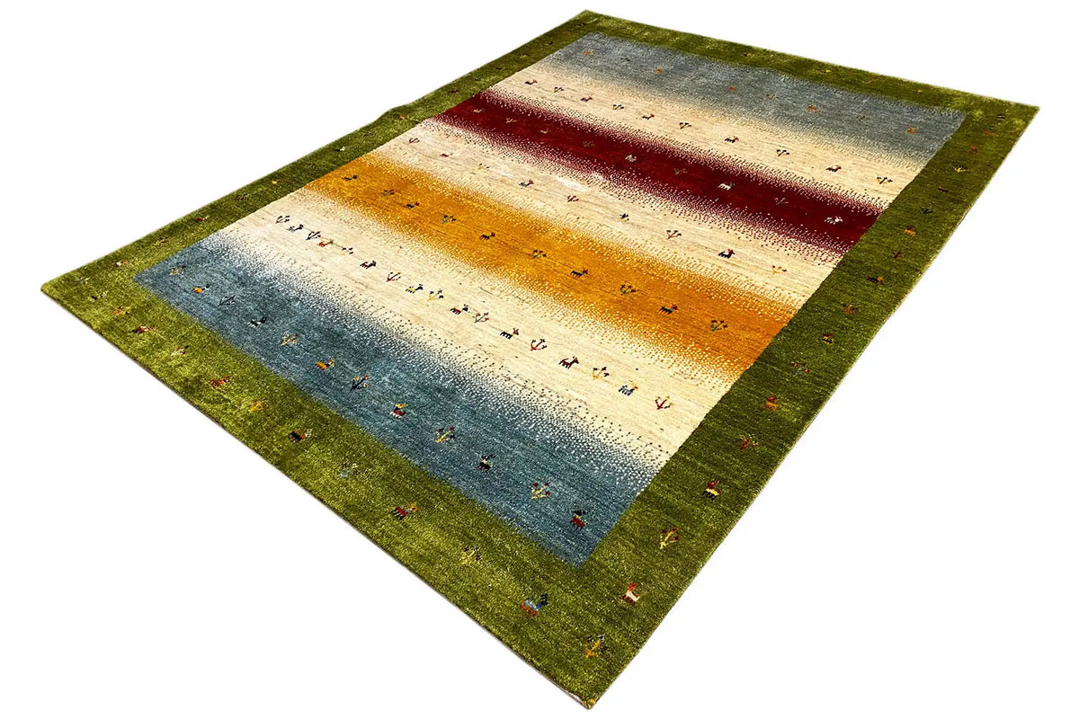 Gabbeh-Lori rug, diagonal view, green border with stripes in yellow, blue, and red.