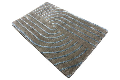 Designer rug with turquoise line swirls, square with rounded corners