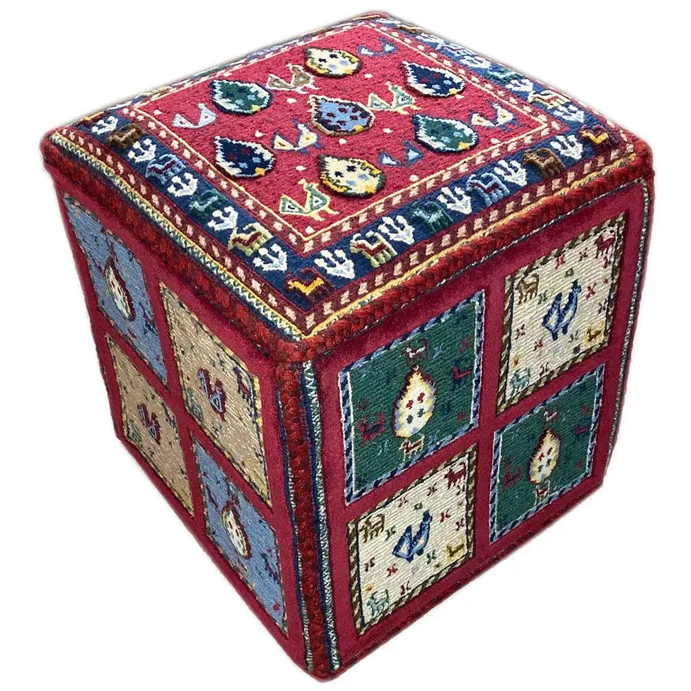 Carpet ottoman with a square pattern: red top, side panels with ornaments and animal motifs