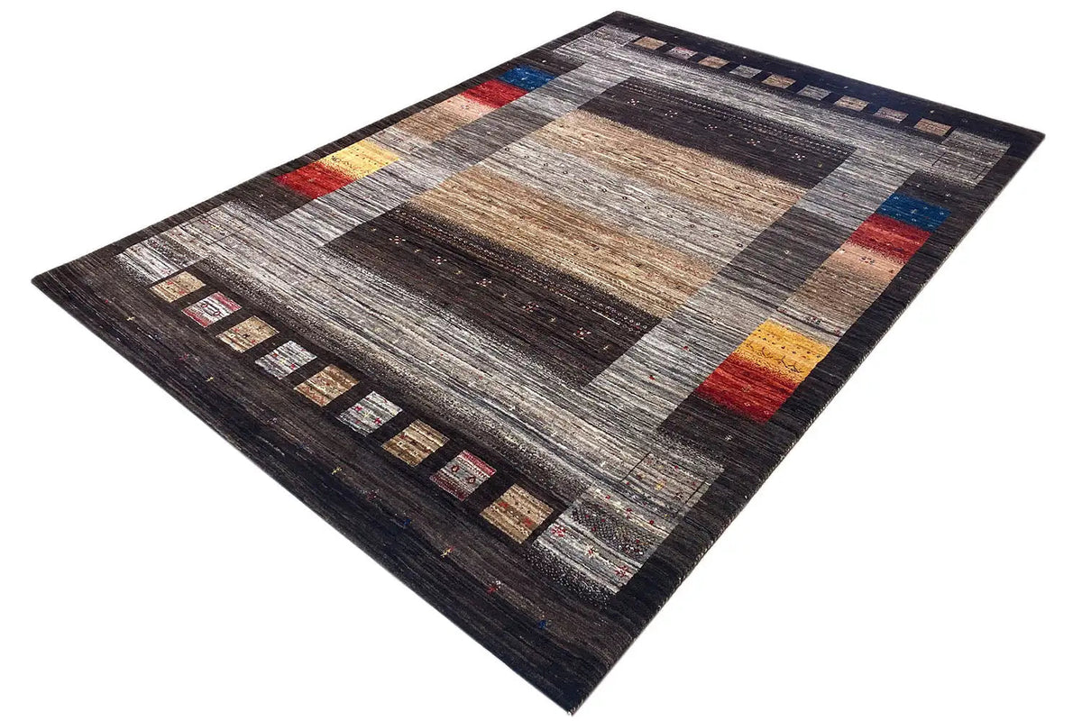Gabbeh-Lori rug with wide stripes and color accents in red, blue, and yellow