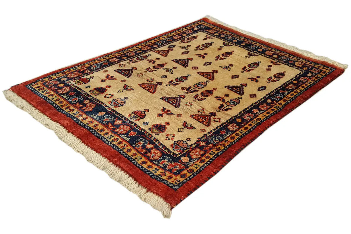 Rug with a beige center, red border, and blue ornamental border, with fringes along the edges