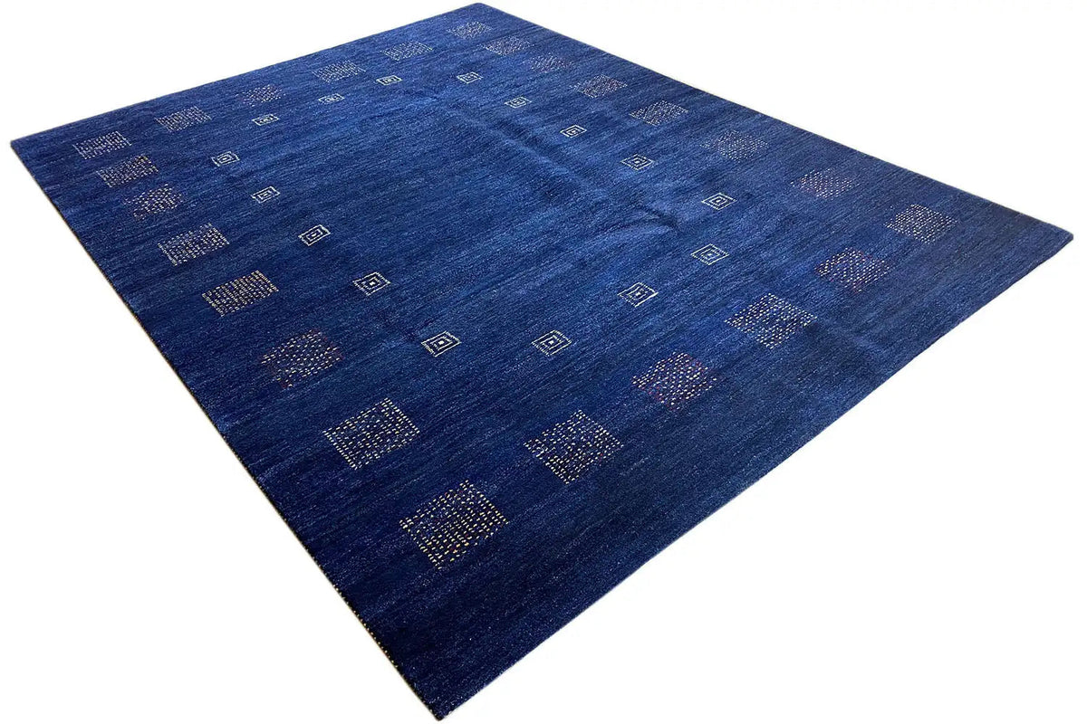 Blue carpet with geometric square patterns in an even distribution