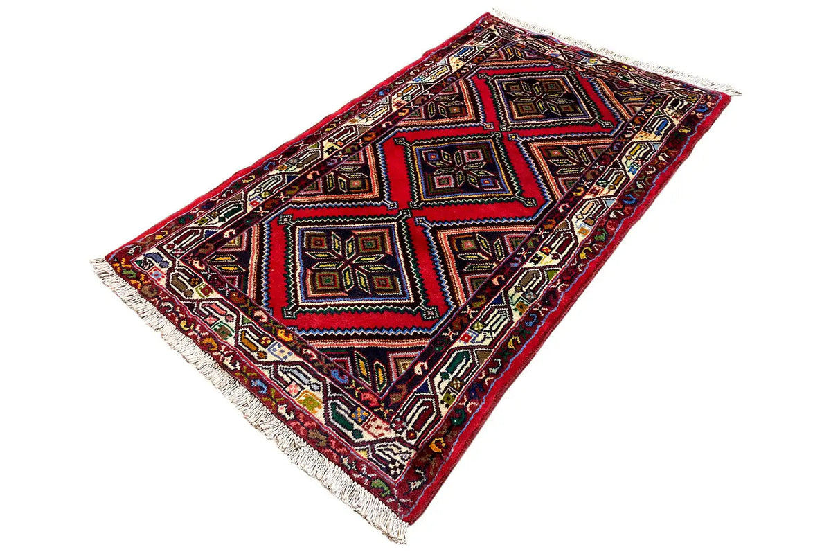 Rectangular rug with geometric squares in deep red and turquoise, fringes