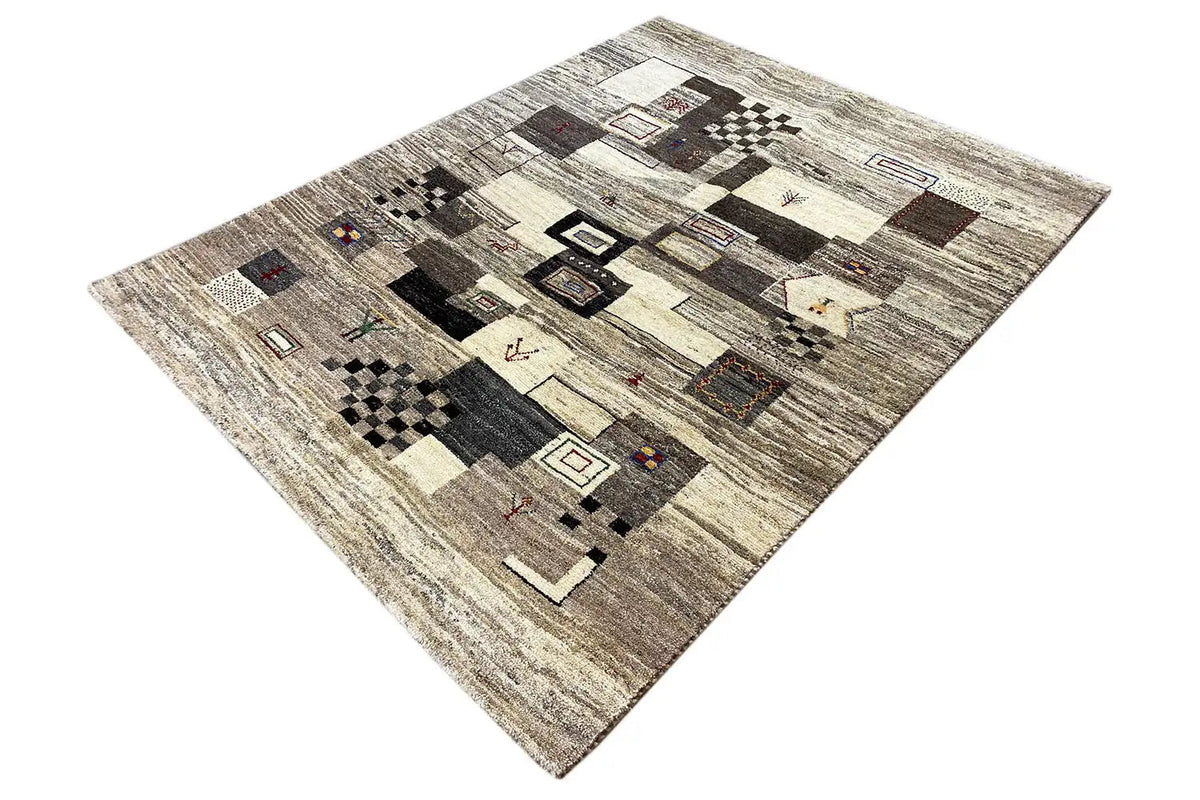Gabbeh rug with diamond and tile patterns in gray, beige, and dark brown