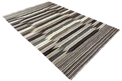 Kilim Qashqai rug laid diagonally, striped pattern in dark gray, beige, and brown