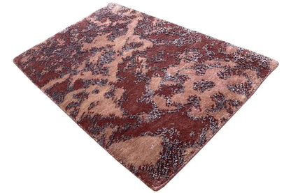 Designer rug 60x40 cm, photographed diagonally; abstract pattern in Bordeaux and beige