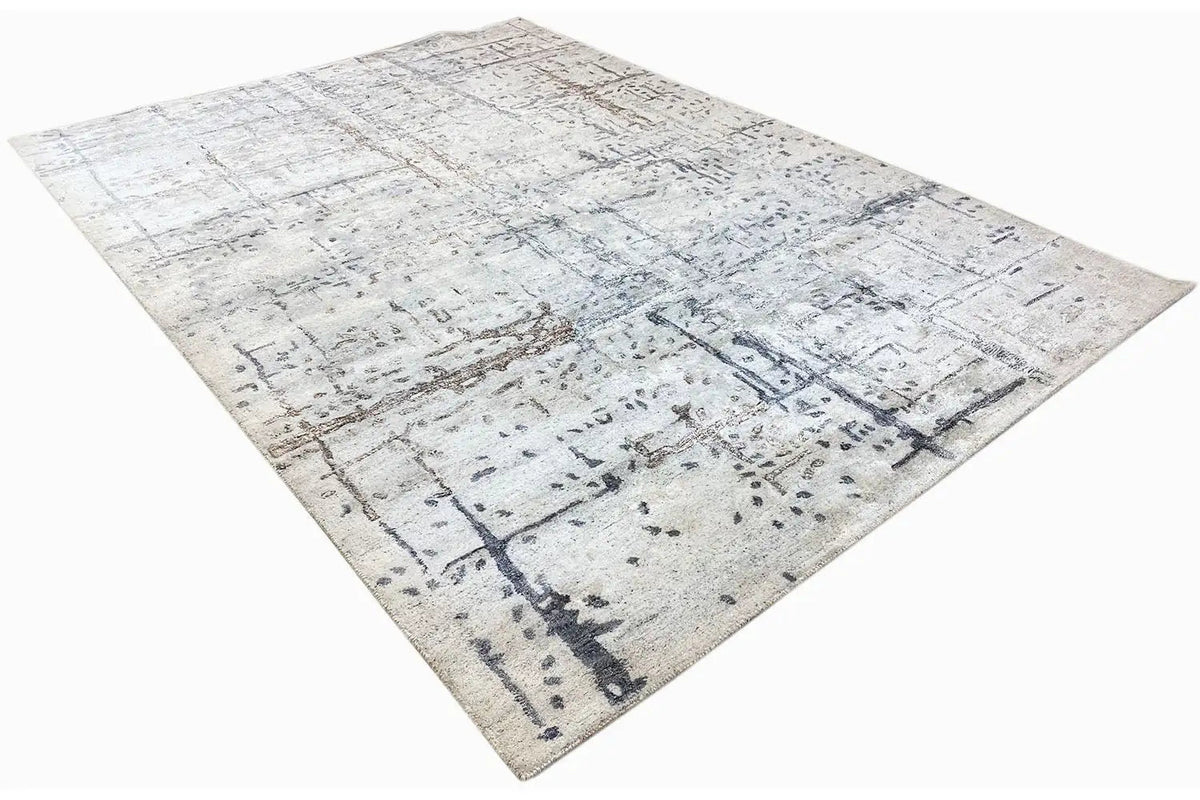 Hand-tufted rug 237x167 cm, photographed at an angle, geometric line pattern in light tones