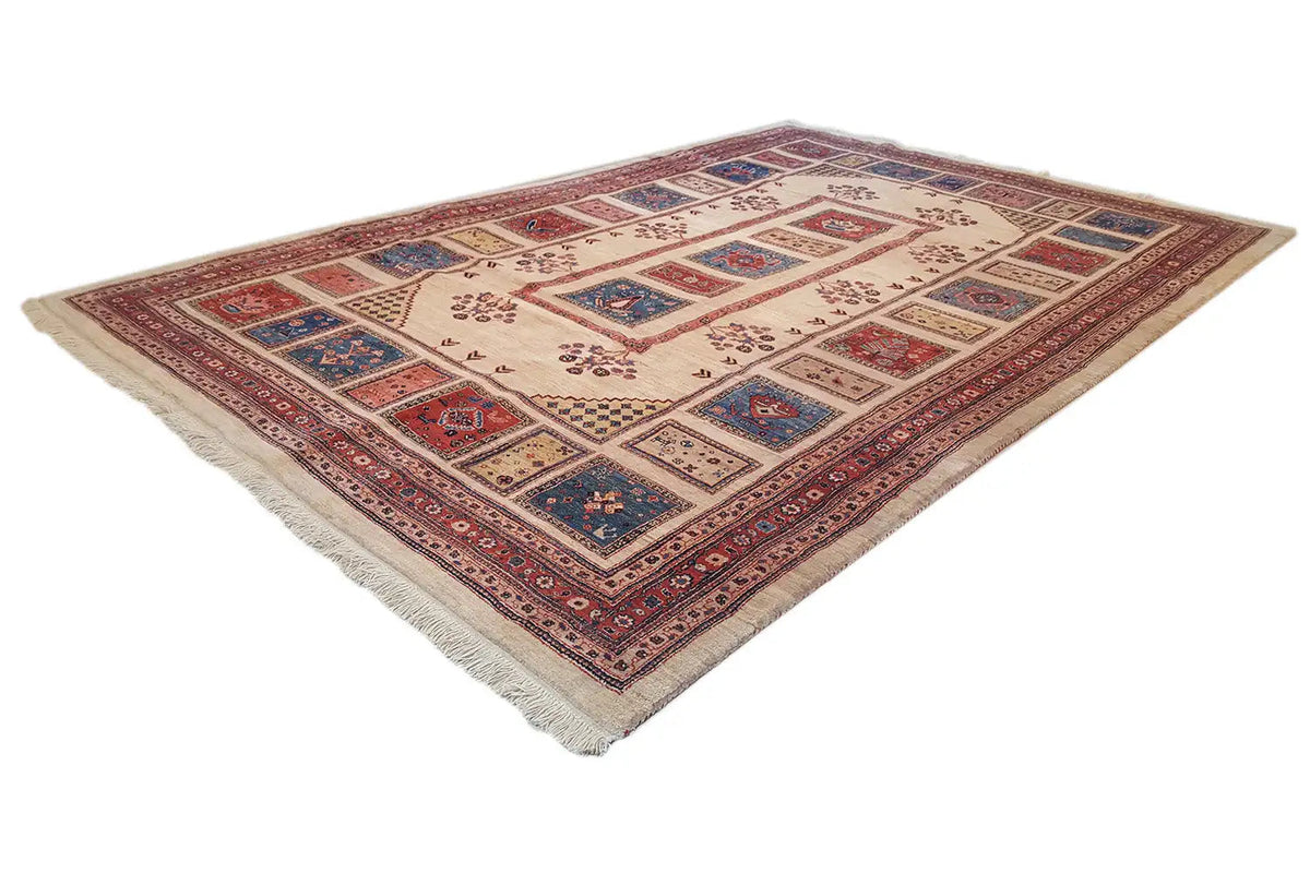 Beige carpet with a border in shades of red and blue and a central medallion