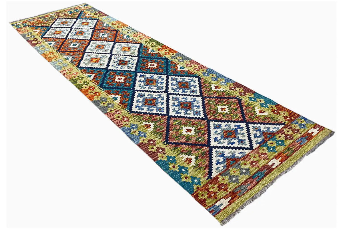 Kilim runner with geometric diamond patterns and tassels, colorful, long