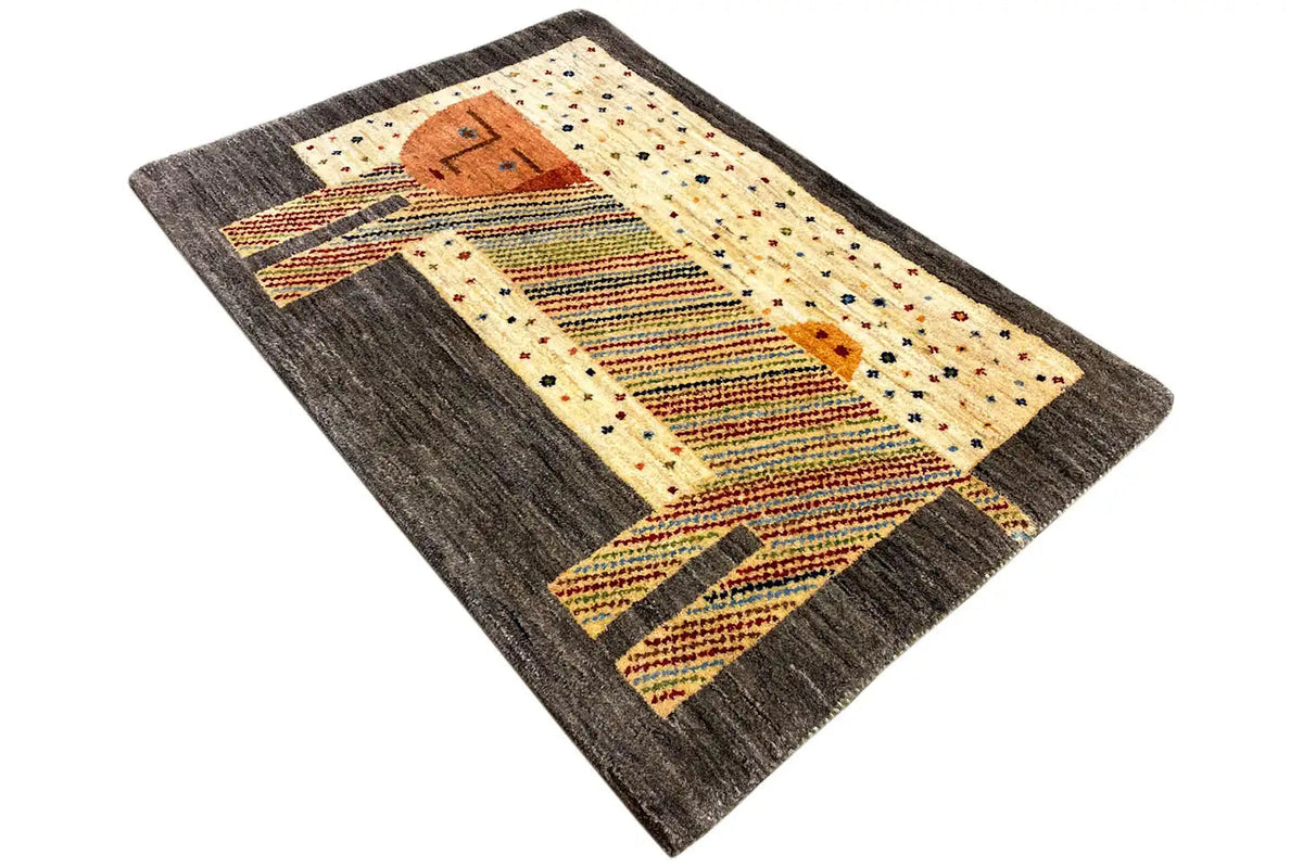 Gabbeh-Lori rug (100 x 66 cm) on the diagonal, dark border with geometric ornaments