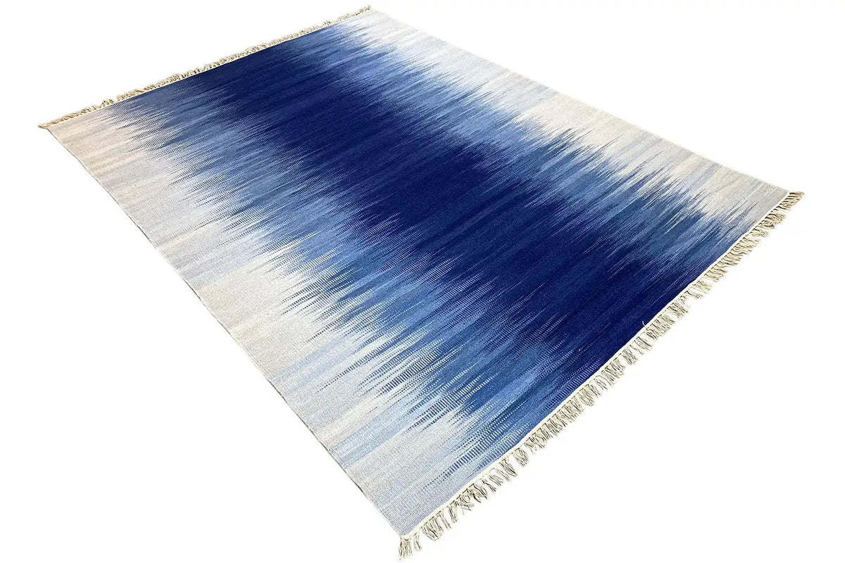 Kilim dhurrie rug, blue-and-white gradient pattern, fringed edge