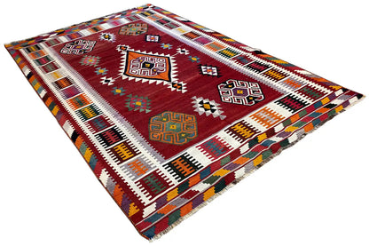 Kilim Qashqai rug, lying diagonally, geometric symbols in red, white, and orange