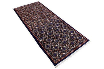 Moud rug, diagonal: dark blue-brown pattern with a reddish mid-tone