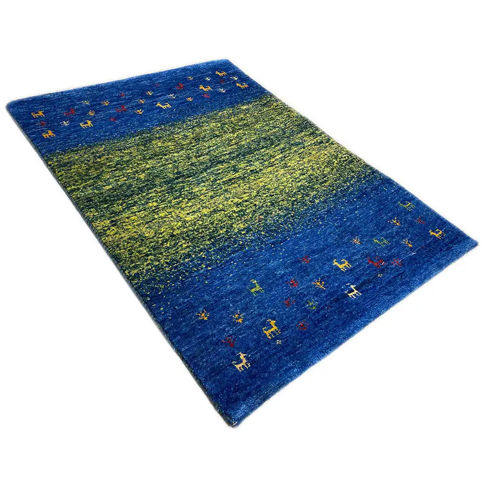 Gabbeh rug Lori (85x61 cm): blue-green rug, angled, colorful animal motifs