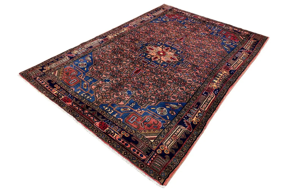 Hamadan rug in blue and red with a central medallion and borders