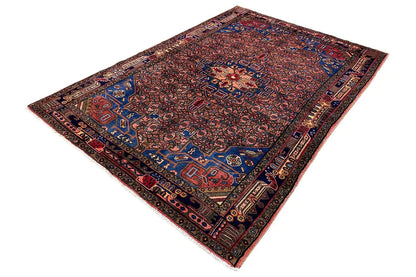 Hamadan rug in blue and red with a central medallion and borders
