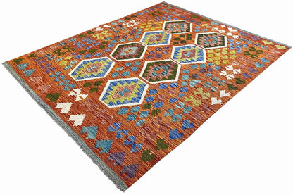 Kilim with square and hexagonal decorative panels, colorful accents in orange and blue