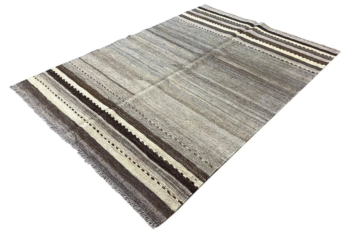 Kilim rug spread diagonally: gray striped pattern with brown-beige-black decorative lines