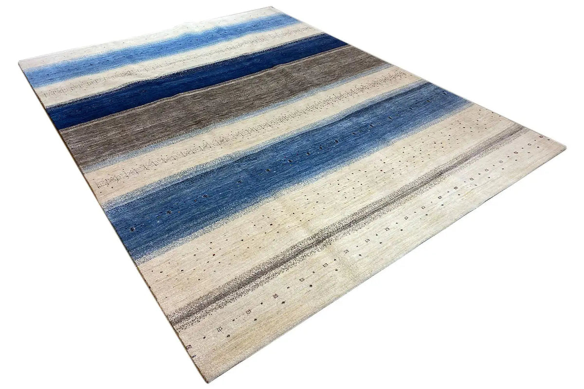 Gabbeh-Lori rug, diagonal: horizontal blue-gray bands on a beige background.