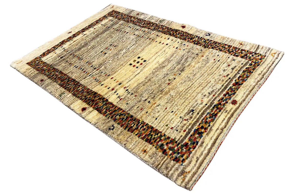 Gabbeh rug with a striped center field and brown border strip