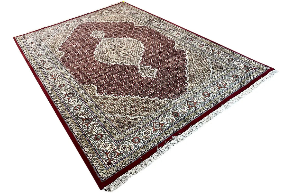 Indo-Täbriz carpet, diagonal, brown field with beige border and red edging