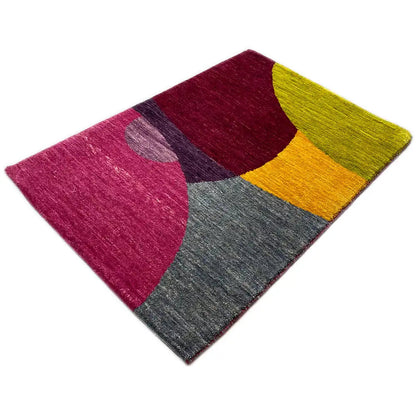 Gabbeh rug with a geometric layout: magenta, yellow, gray, and dark accents